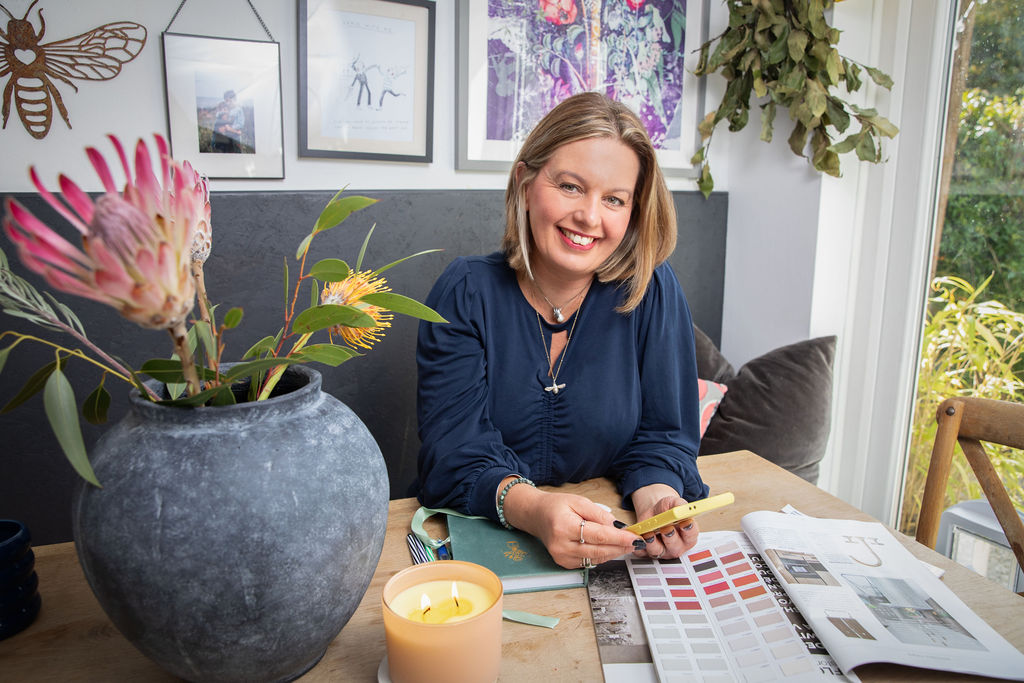 Gini at kitchen table with colour samples